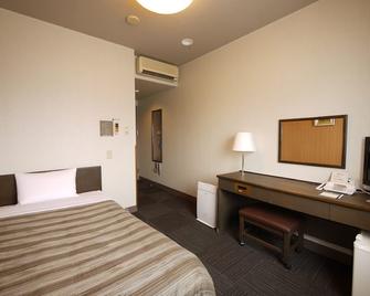 Hotel Route-Inn Court Minami Matsumoto - מאטסומוטו - חדר שינה