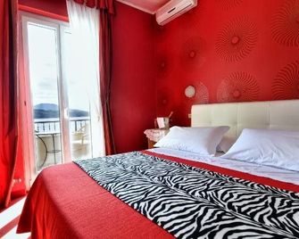 Hotel La Sacca - סטרסה - חדר שינה