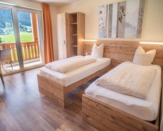 COOEE alpin Hotel Dachstein - Gosau - Bedroom