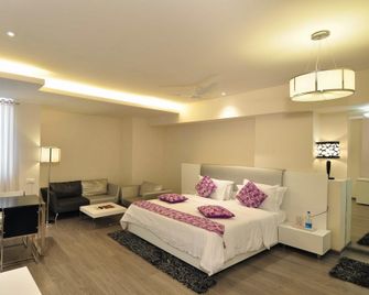 Hotel Vijay Parkinn Coimbatore - Coimbatore - Bedroom