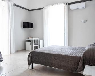 Hotel Costanza - Catania - Slaapkamer