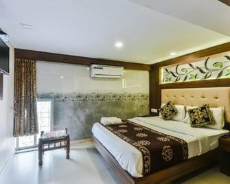 Guest Inn Hospitality - Bombay - Habitación