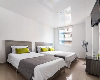 Hotel Exito - Pereira - Schlafzimmer