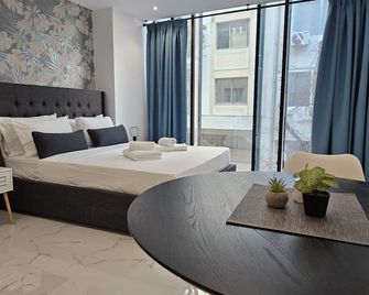 Nikis 20 Suites - Athen - Schlafzimmer