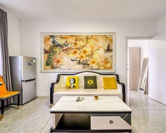Wanda Serviced Apartment (Hengshan Road, Harbin) - Harbin - Living room