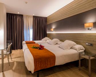 Hotel Avenida - א קורונה - חדר שינה