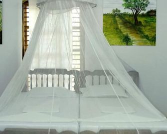 Jickys Nest - Varkala - Phòng ngủ