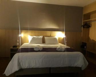 Legacy Hotel - Guaratingueta - Ložnice