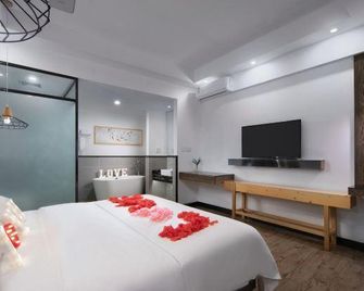 Time Inn - Wenchang - Camera da letto