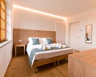 Villa Lucilla - B&B Rooms and Pool - Potenza Picena - Slaapkamer