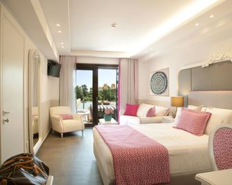 Avaton Luxury Beach Resort - Relais & Chateaux - אוראנופולי - חדר שינה
