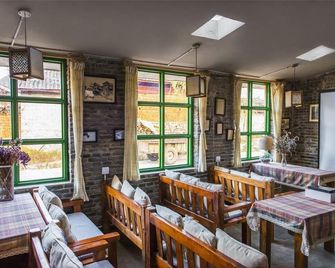 Dengba Snow Mountain International Youth Inn - Lijiang - Restaurante