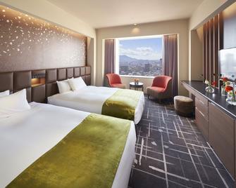 ريجا رويال هوتل كوكورا - كيتاكيوشو - غرفة نوم