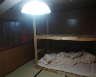 ez guest house - Ky-ô-tô - Phòng ngủ