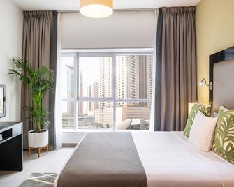 卡羅拉都會中央酒店式公寓 - 杜拜 - 杜拜 - 臥室