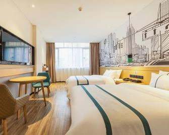 City Comfort Inn (Yangjiang Baili Plaza Municipal Government) - Yangjiang - Спальня