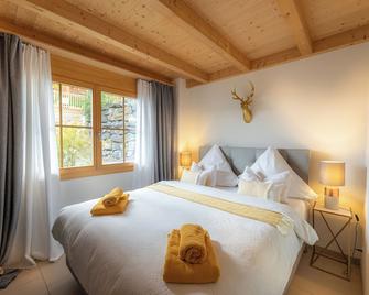 Königin der Alpen - Beatenberg - Schlafzimmer