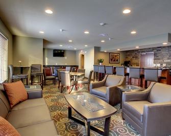 Cobblestone Inn and Suites - Rugby - Rugby - Area lounge