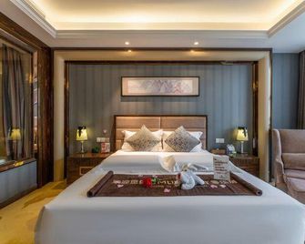 Chengkong Carrey International Hotel (Jingmen Railway Station Jingchu University of Technology) - Jingmen - Ložnice