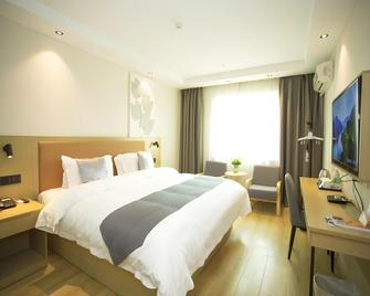 Greentree Inn Jingdezhen Square North Road Express Hotel - Jingdezhen - Slaapkamer
