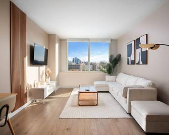 Freedom Tower View -Amenity Packed with Pool -minutes to NYC - Hoboken - Living room