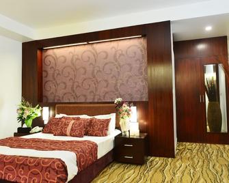 Amazon Lilly Lake View Residence - Dhaka - Phòng ngủ