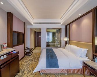 Linyi Shangcheng Blue Horizon Hotel - Linyi - Bedroom