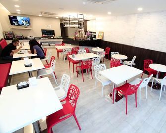 Grand SH Hotel - Miri - Restaurante