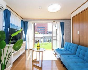 Yokkaichi Motomachi Hotel - Yokkaichi - Living room