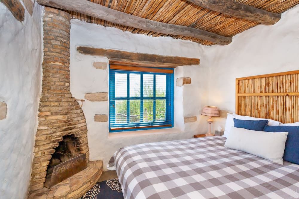 Bedroom view of San Carlos Room with sweeping views of West Texas