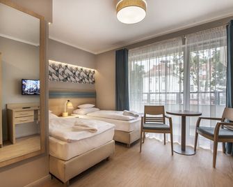 Hotel Cesarskie Ogrody - סווינוצ'י - חדר שינה