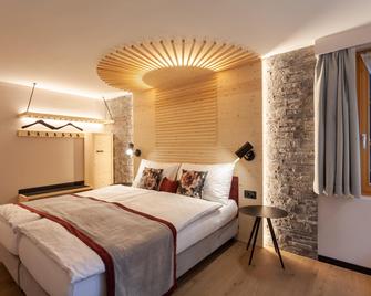 Sonne Andermatt Swiss Quality Hotel - Andermatt - Bedroom