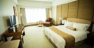 Blue Horizon Xinyue Hotel - Dongying - Bedroom