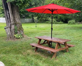 Cozy Cabin Gateway with Pool and Firepit - Montgomery - Patio