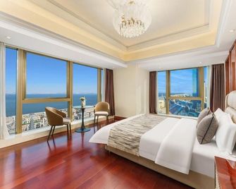Muyu Seaview Collection Apartment Hotel (Dalian Venice Water City Gangdong 5th Street) - Dalian - Bedroom
