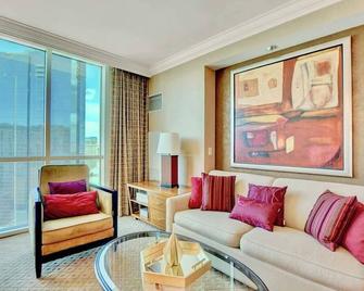 No Resort Fee ! Strip View Suite - Pools & Valet - Paradise - Living room