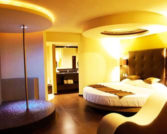 Sensaciones Motel Boutique - Adults Only - Cancún - Schlafzimmer