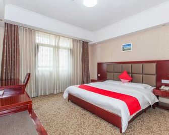 Wuhan Kanghao Hotel - E’zhou - Habitación