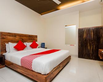 OYO Hotel Sai Comforts - Vasai - Habitación