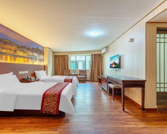 Guangzhou Hengxiong Business Hostel - Cantón - Habitación