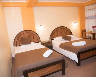 Hostal Milagros Inn - Samary Inn - Puno - Bedroom