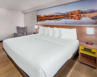 Days Inn & Suites by Wyndham Greeley - Greeley - Makuuhuone