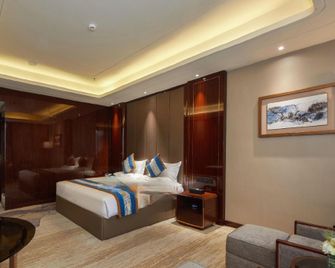 Zhenjun Hotel (Yinchuan Railway Station) - Yinchuan - Bedroom