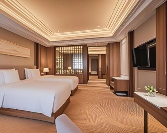 Luxury Blue Horizon Hotel - Tai'an - Schlafzimmer