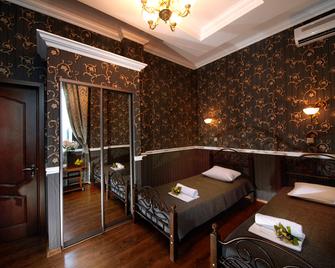 Guest House Dynasty Sochi - Sochi - Bedroom