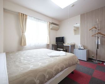 Hotel Select Inn Shimada Ekimae - Shimada - Camera da letto