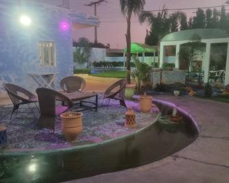 Air-conditioned family accommodation garden with private pool - Safi - Innenhof