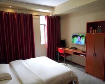 Ivy Business Hotel - Changde - Camera da letto