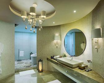 Novotel Kolkata Hotel And Residences - כלכולתה - חדר שינה