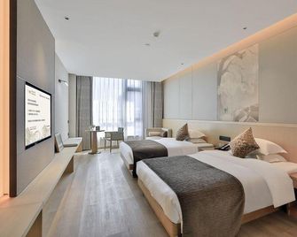 Zhongda Langyuan Hotel (Lishui) - Lishui - Schlafzimmer